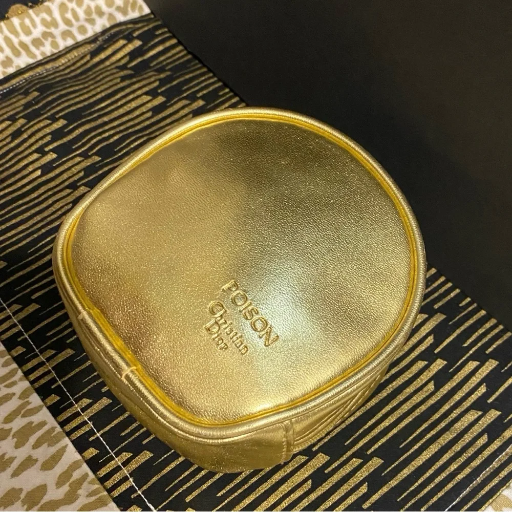 DIOR GOLD ZIPPER POUCH